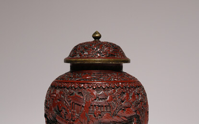 A CHINESE CINNABAR LACQUER OVOID VASE AND COVER
