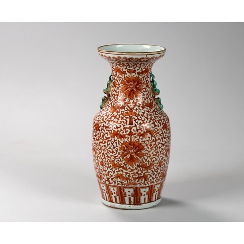 A CHINESE IRON-RED 'BAT, LOTUS AND MUSICAL STONE' VASE, QING...