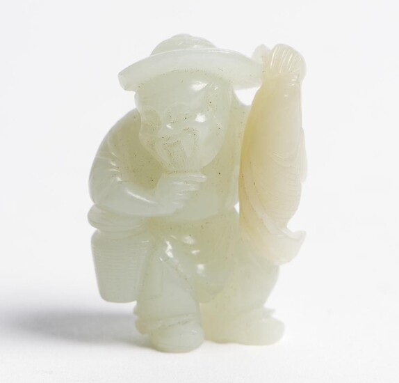A CHINESE PALE CELADON JADE CARVING OF A FISHERMAN QING DYNASTY (1644-1912), CIRCA 19TH CENTURY