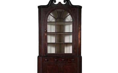 A CHIPPENDALE EBONISED AND STAINED HARDWOOD CORNER CABINET, ...