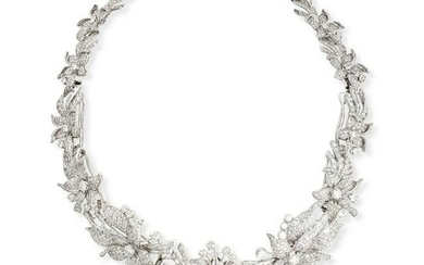 A CONVERTIBLE DIAMOND NECKLACE in platinum, in a stylised floral design formed of seven brooches and