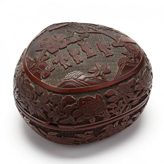 A Chinese Peach Shaped Carved Cinnabar Lacquer Box and