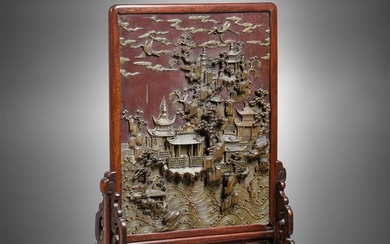 A Chinese Qiyang soapstone 'landscape' table screen