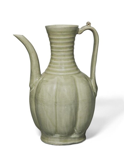 A Chinese Yaozhou-type celadon-glazed lobed ewer, Song/Yuan dynasty, the lobed body atop a slightly flaring foot, rising to a ribbed neck attached with a strap handle opposite a curved spout, covered in an allover olive-green glaze, 20.2cm high 宋/元...