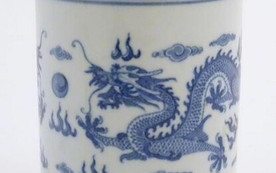 A Chinese blue and white cylindrical brush pot