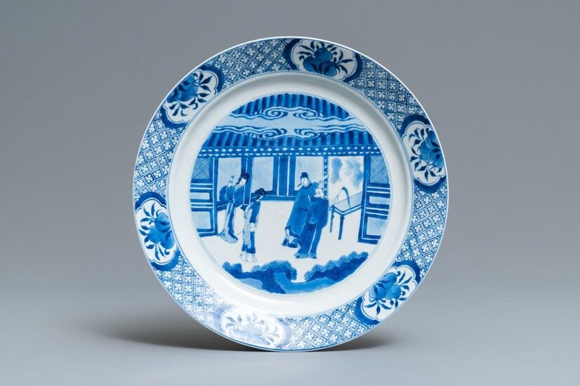 A Chinese blue and white dish with figures...