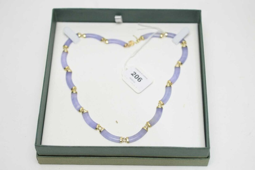 A Chinese blue chalcedony and yellow-metal necklace