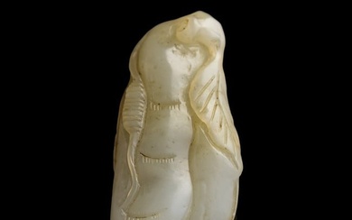 A Chinese carved jade 'pea pod' toggle, 19th century