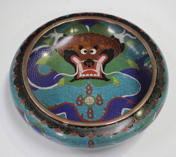 A Chinese cloisonné circular bowl, early 20th century, of shallow form with inverted rim, decor