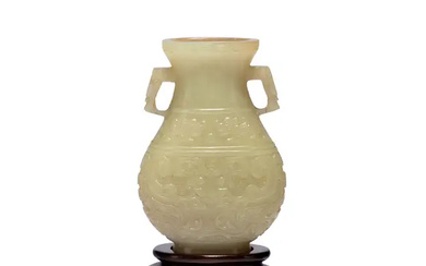 A Chinese russet-celadon jade vase, hu Ming/Qing dynasty, 17th century The weighty...