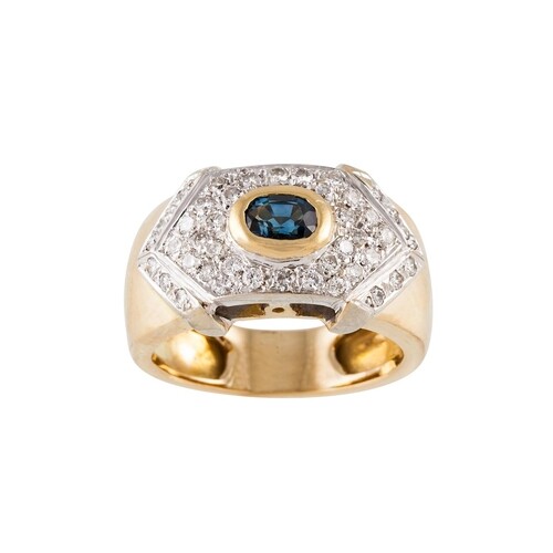 A DIAMOND AND SAPPHIRE DRESS RING, the oval sapphire to a pa...
