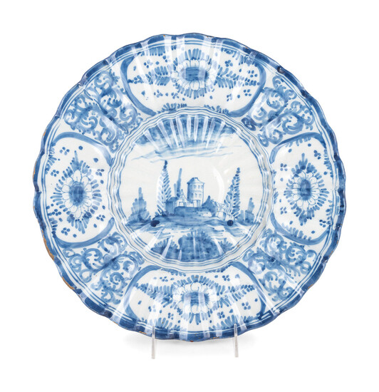A Delft Style Blue and White Glazed Earthenware Charger