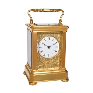A French gilt brass carriage clock with push-button repeat