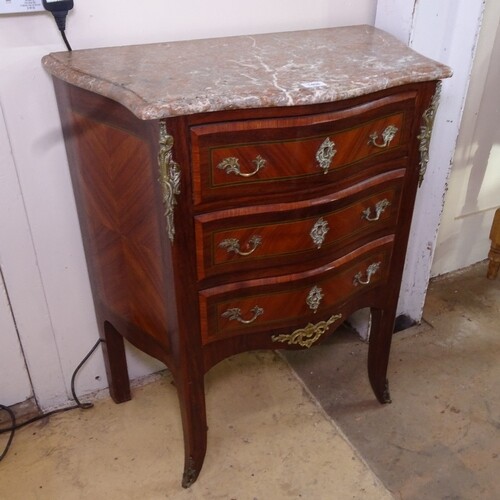 A French kingwood serpentine-front commode, with shaped marb...