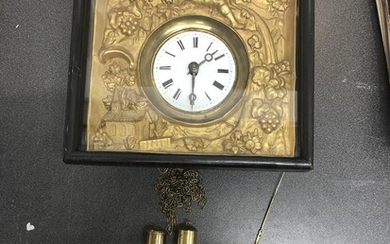 NOT SOLD. A French wall clock. Late 20th century. H. 35 cm (150 cm including chains). W. 30 cm. – Bruun Rasmussen Auctioneers of Fine Art