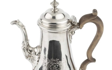 A George II silver baluster coffee pot, the hinged domed...