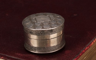 A George III silver circular pill box or bonbonniere, push-f...
