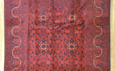 A HANDKNOTTED PURE WOOL FINE AFGHAN KUNDUS RUG