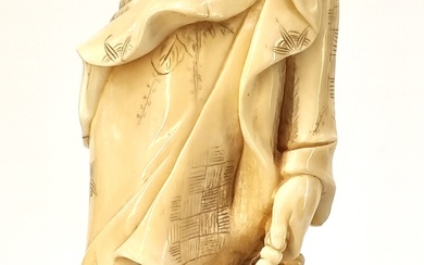 A JAPANESE MARINE IVORY CARVED OKIMONO