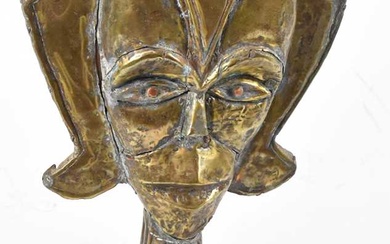 A Kota reliquary figure, Gabon, brass applied and on contemporary...