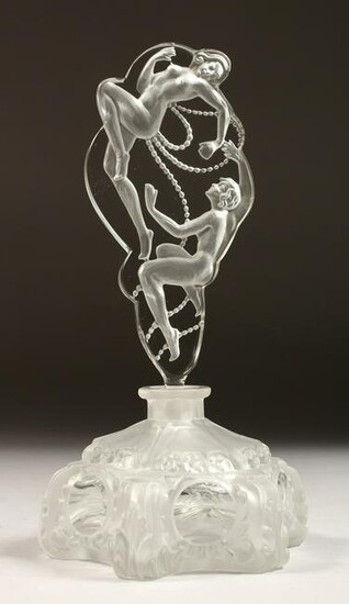 A GLASS SCENT BOTTLE AND STOPPER IN THE LALIQUE STYLE
