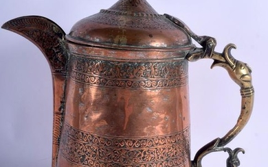 A LARGE 19TH CENTURY MIDDLE EASTERN COPPER JUG