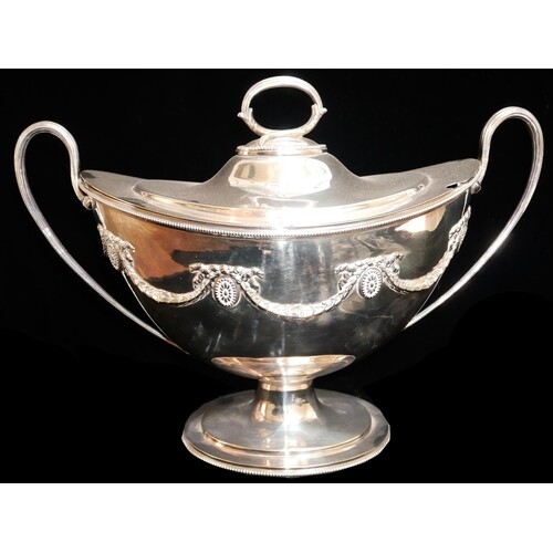 A LARGE VICTORIAN SILVER PLATED OVAL NAVETTE FORM SOUP TUREE...