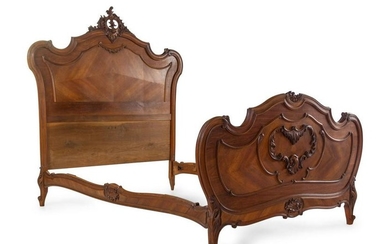 A Louis XV Style Walnut Bed