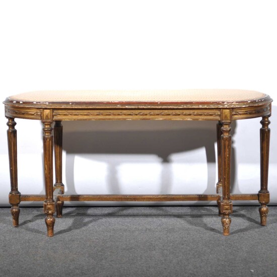 A Louis XVI style gilt gesso duet stool