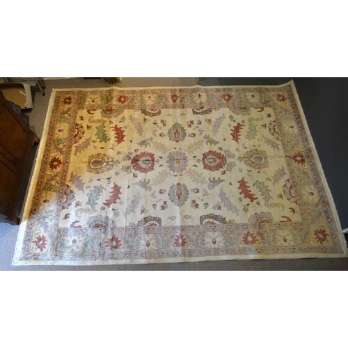 A North West Persian Style Woollen Carpet with an all over d...