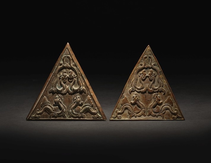 A PAIR OF EXCEEDINGLY RARE SILVER 'MAKARA' PLAQUES SONG DYNASTY