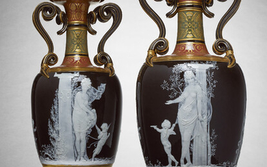 A PAIR OF MINTONS PATE-SUR-PATE DARK CHOCOLATE-BROWN TWO-HANDLED VASES, 'THIEF' AND 'MENDIANT' DATED 1875, ONE SIGNED AND DATED L.(OUIS) SOLON (18)75, THE OTHER SIGNED L.(OUIS) SOLON, RECORDED AS SHAPE NO. 1946