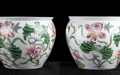 A PAIR OF PAINTED PORCELAIN CACHE-POTS China, 20th century Circular...
