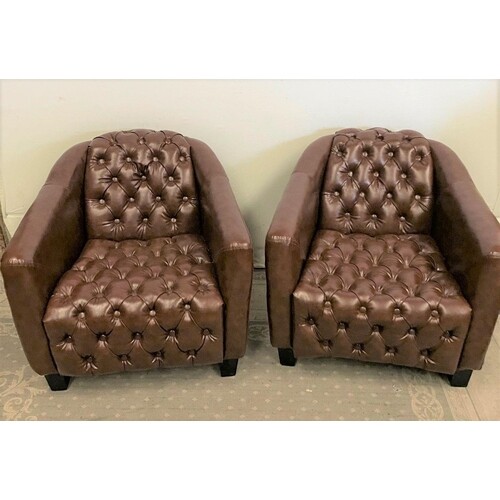 A PAIR OF TAN BROWN BUTTON BACK AVIATOR ARMCHAIRS, with dark...