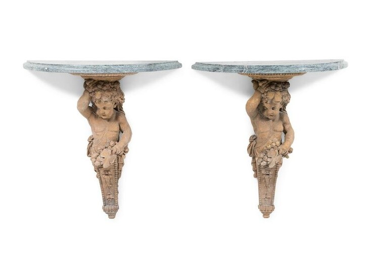 A Pair of French Cast Stone Consoles d'Applique with