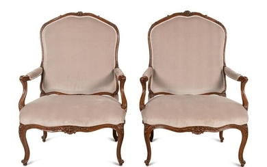 A Pair of Oversized Louis XV Carved Beechwood Fauteuils