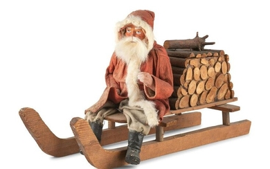 A Papier-Mache Santa Claus on Log Sleigh