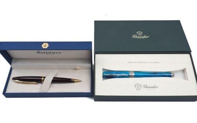 A Pineider Avatar Ur Azure fountain pen, the feather-shaped clip in marine steel and soft-close cap lock with details in palladium 0.2, the central band decorated with an engraved skyline of Florence, in original case, together with a A Waterman...