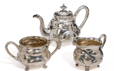 A Russian silver teapot, gilt interior, chased and embossed with rounded and braided fields. Fredrik Elias Syrén, assayer Eduard Fedorovich Brandenburg 1864, St. Petersburg town mark, 84 standard. With matching silver sugar bowl and creamer. Denmark...