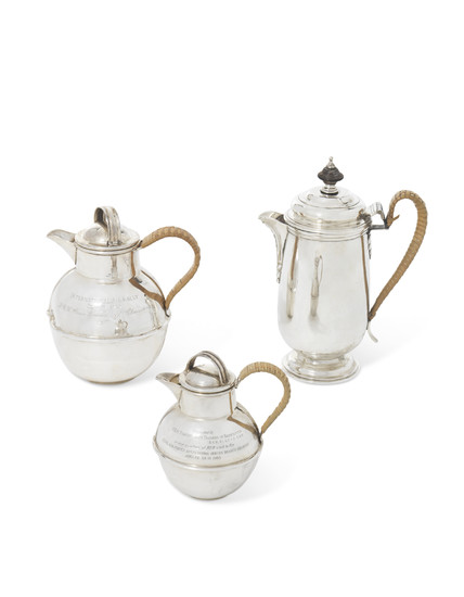 A SILVER HOT WATER JUG AND TWO SILVER HOT MILK JUGS, MARK OF MARSTON AND COMPANY, BIRMINGHAM, 1985; MARK OFJOHN HENRY RAWLINGS, LONDON, 1908; MARK OF KENNETH TYLER KEY, BIRMINGHAM, 1970