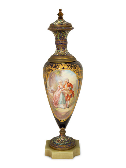 A Sevres Style Porcelain And Champleve Enamel Covered Urn with Gilt Bronze Mounts