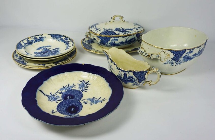A Staffordshire creamware blue and white dinner service, including three tureens, five serving