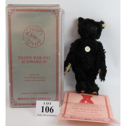 A Steiff limited edition 1912 replica black teddy bear with ...