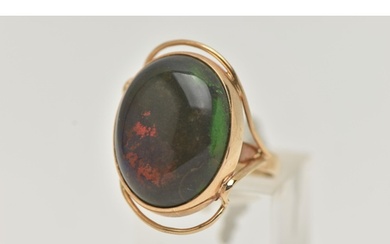 A TREATED OPAL RING, the oval opal cabochon in a collet sett...