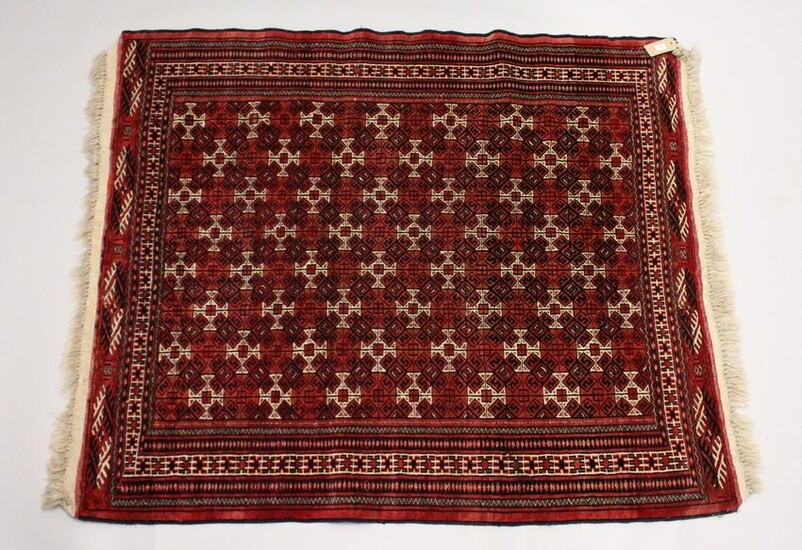 A TURKOMEN YAMUD CARPET, red ground with all over