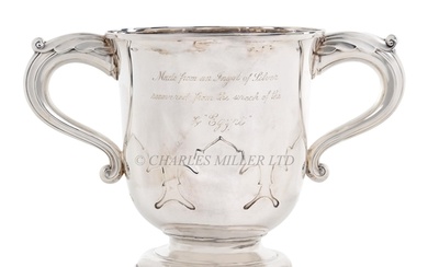 A TWIN-HANDLED CUP MADE OF SILVER RECOVERED FROM THE P&O...