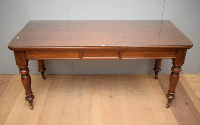 A VICTORIAN THREE DRAWER DESK ON CASTORS WITH GLASS TOP (75H x 167W x 76D CM) (PLEASE NOTE THIS HEAVY ITEM MUST BE REMOVED BY CARRIE...