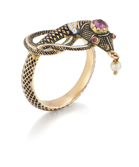 A Victorian gold ruby and enamel snake ring, of knotted...