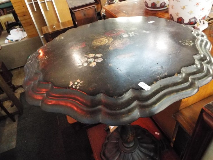 A Victorian papier-mâché table having hand painted floral a...