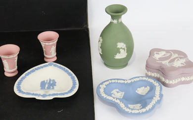 A Wedgwood (England) 'Jasperware' collection, comprising a white on lilac...